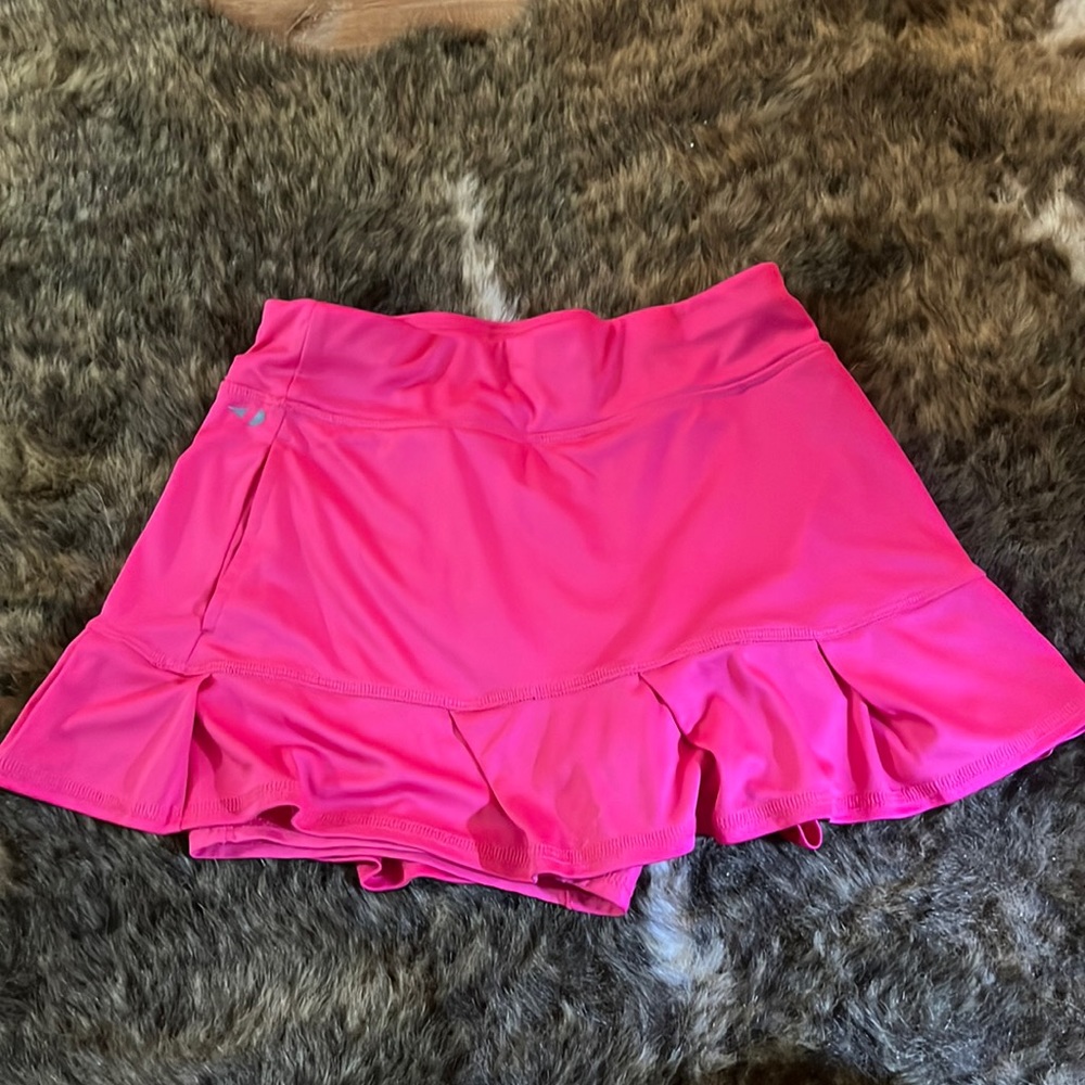 Tennis skirt with shorts underneath. Worn once in great condition.